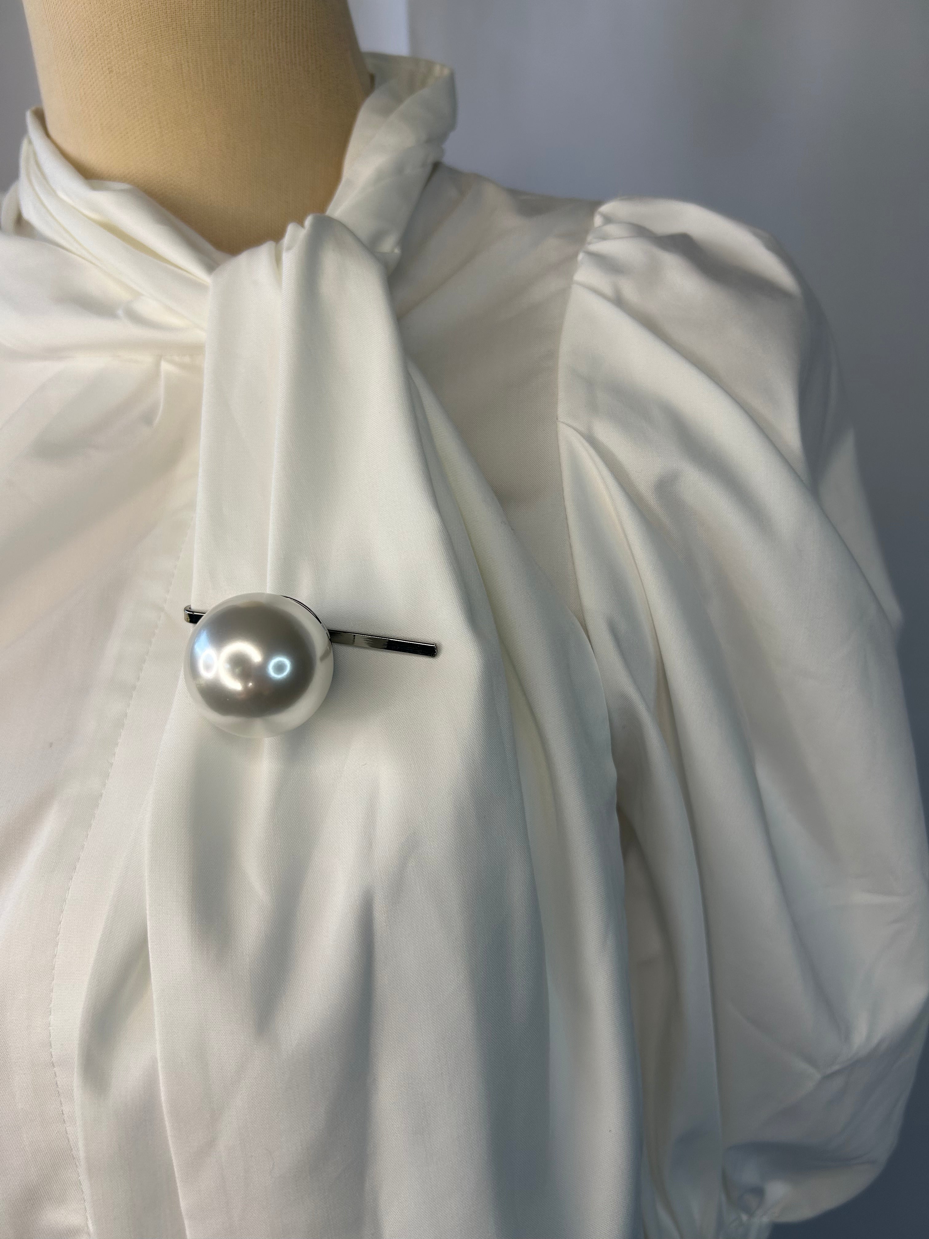 White Blouse With Pearl Brooch Pin